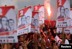 Para pendukung Jokowi-JK dalam Pilpres 2014 dalam acara kampanye di Makassar (Foto: Reuters)
